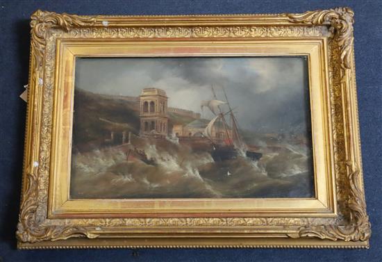 19th century English School Lifeboat men setting out from the coast, a barracks and town beyond 10 x 16in.